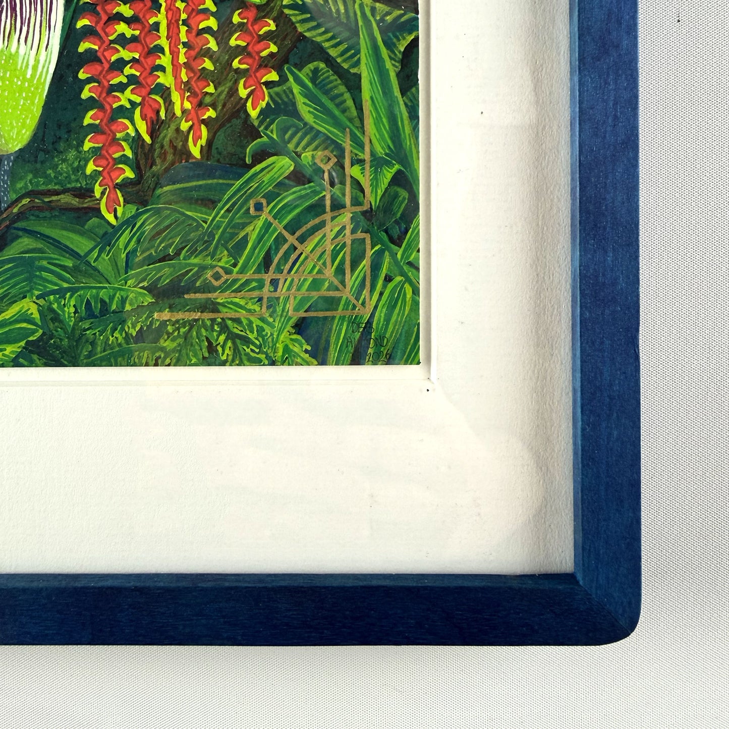 Framed artwork of a tropical plant with red flowers on a white background