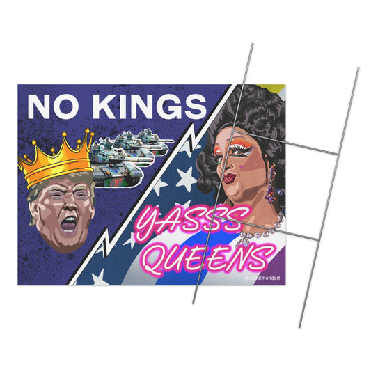 A political yard sign placed in a grassy field with wildflowers. The sign features the graphic "No Kings, Yasss Queens," which contrasts a crowned caricature of Donald Trump and military tanks, with a stylized portrait of a drag queen against a star-spangled background.
