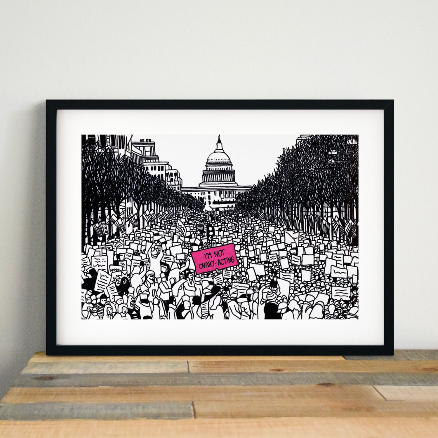 Art print in black and white with a neon pink sign reading 'I'm Not Ovary-Acting'