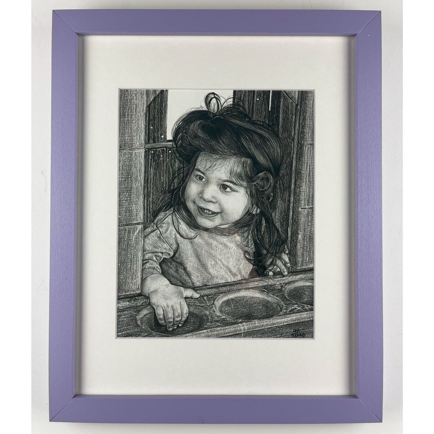 Single portrait of 2 year old girl in lilac frame